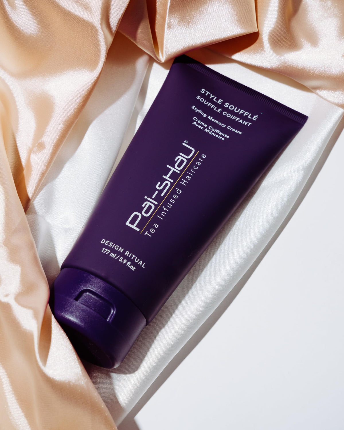 Pai-Shau Style Soufflé adds shine and manageability for polished, touchable hair.