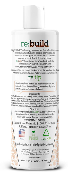 Hands applying Paisle Botanics shampoo on scalp during a refreshing wash.