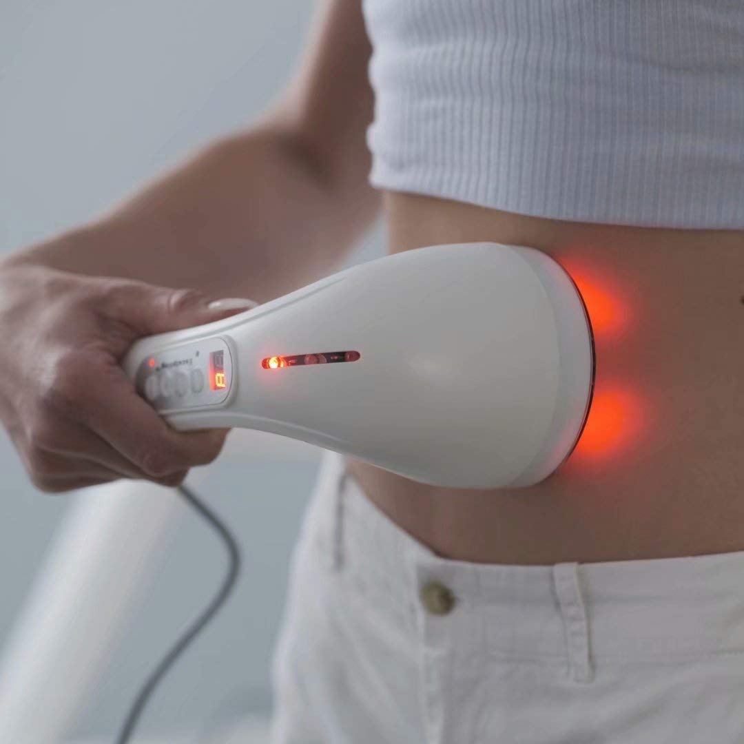 Pakerler NRG device in use during forearm massage for smoother skin appearance.