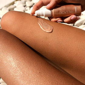 Palladio Body Shimmer Golden Beach shoulders with subtle sun-kissed radiance.