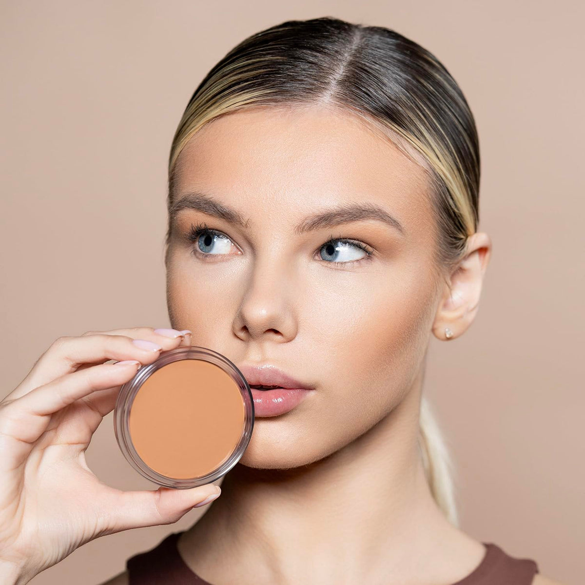 Cocoa butter and coconut oil nourish skin during wear.