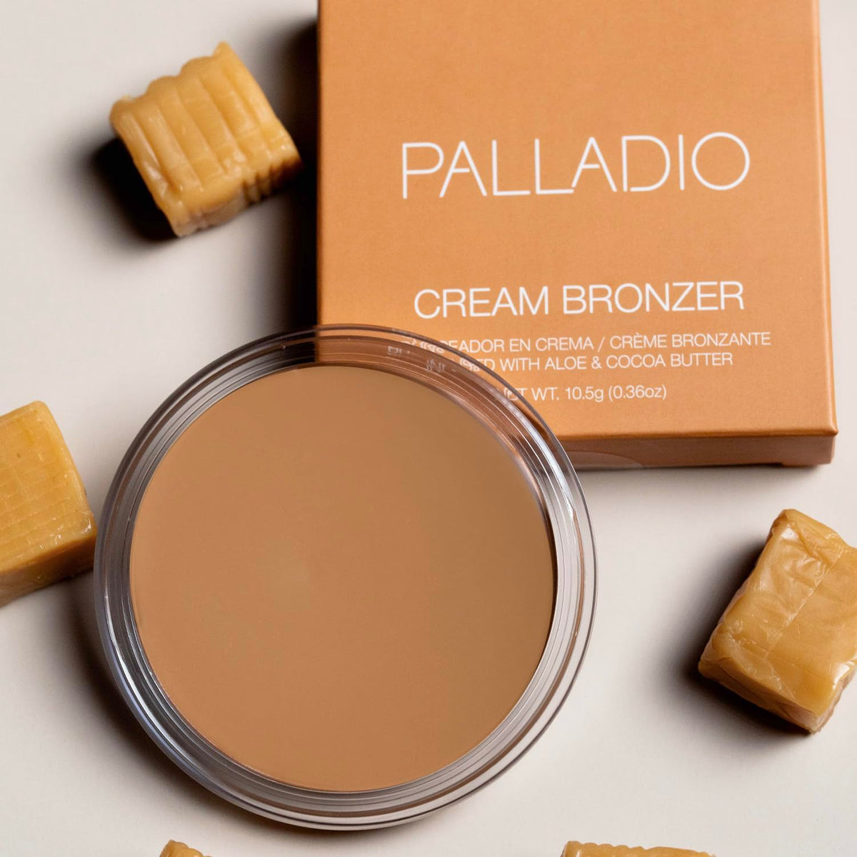 Palladio cream bronzer application on cheekbones for soft contour.