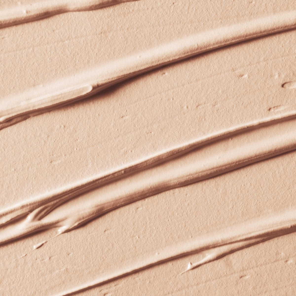 Palladio Rice Primer being applied in dots for even skin prep.