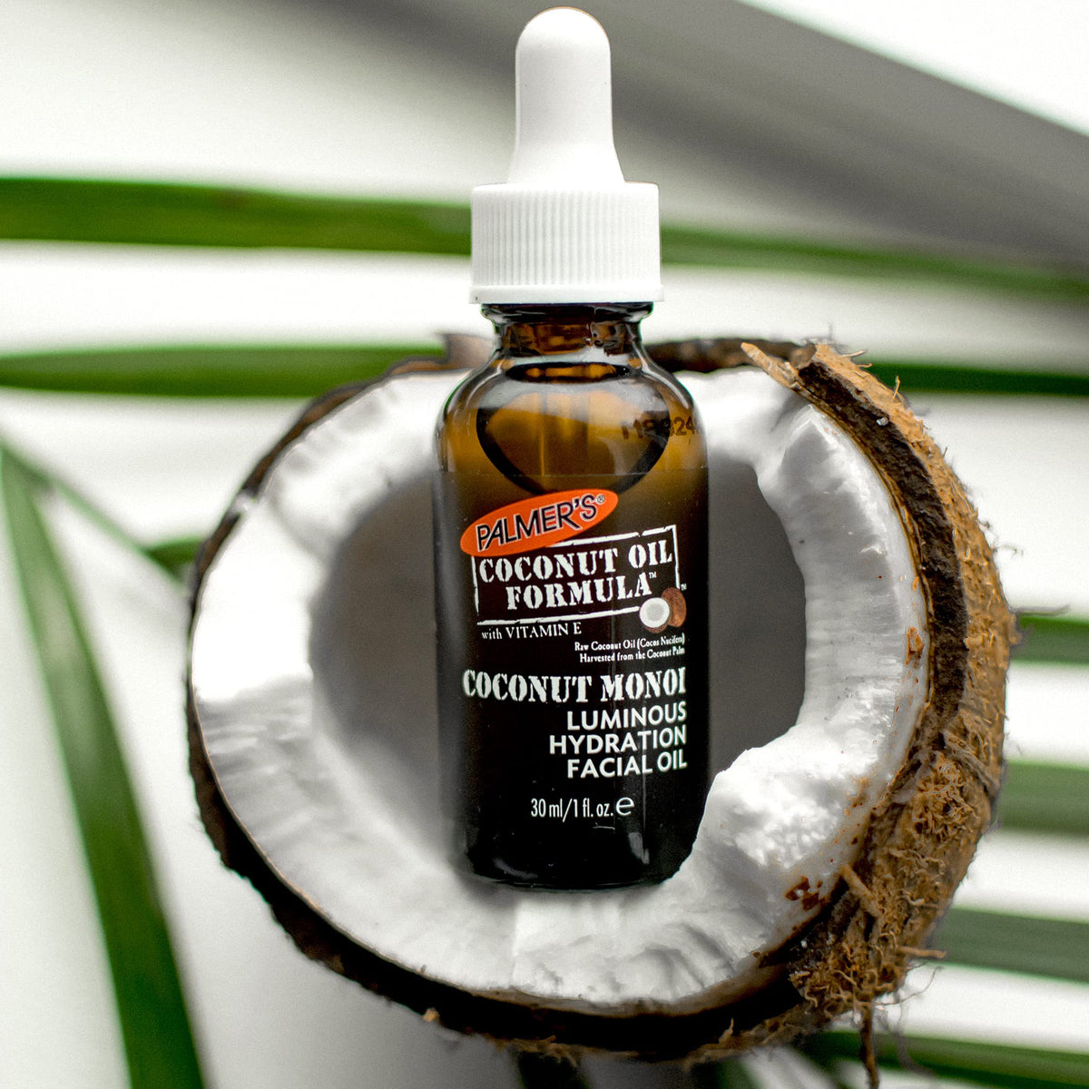 Palmer's natural ingredients coconut oil vitamin E close-up.
