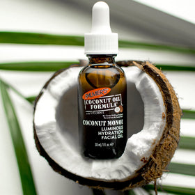 Palmer's natural ingredients coconut oil vitamin E close-up.