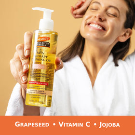 Rosehip fragrance cleansing oil dispensing image showing easy application on dry skin.