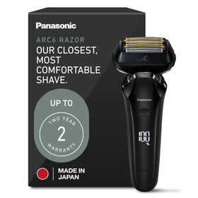 Panasonic ARC6 six-blade head closeup showing precision blades for daily shaves.
