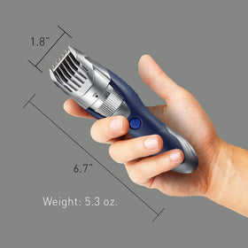 Panasonic ER-GB40-S cleaning brush included for easy maintenance.