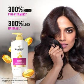 Pantene Advanced Hair Fall Shampoo on bathroom shelf ready for use after shower.