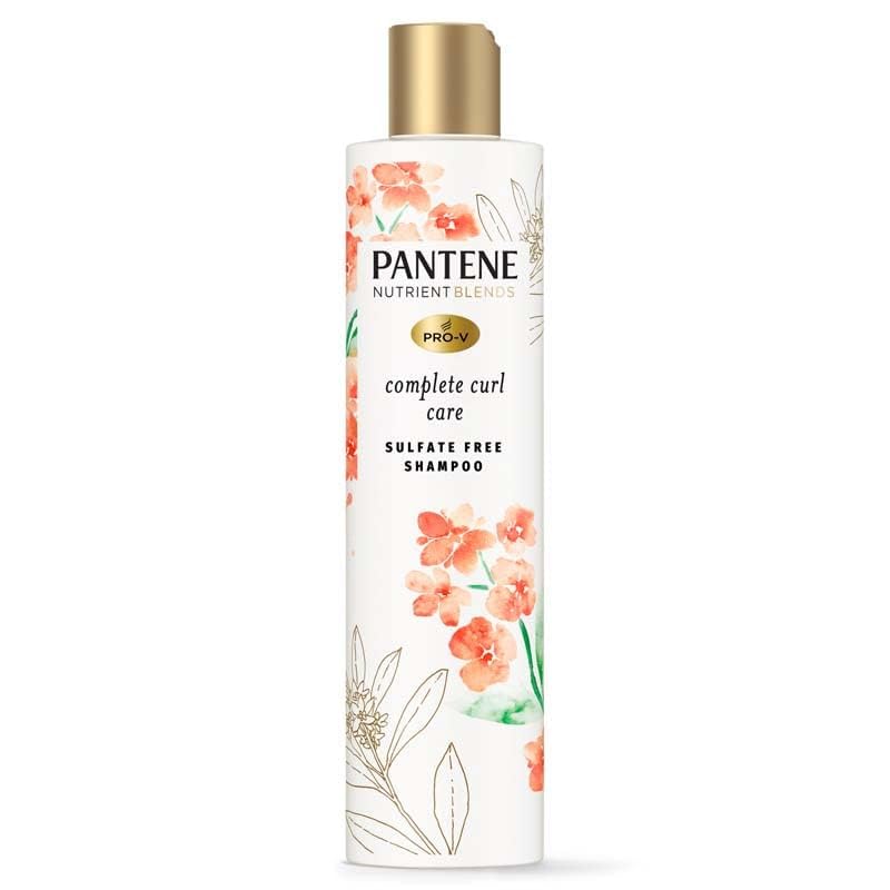 Pantene Complete Curl Care Shampoo with Jojoba Oil bottle pour; hydrates curls for flexible styling.