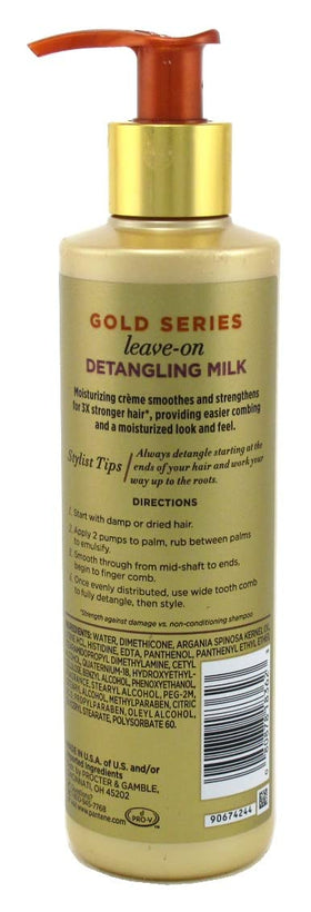 Hands applying Pantene Gold Series Leave-In Milk for smoother detangling