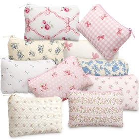 Paterr Bow Floral quilted makeup bag with zipper for quick access on the go.