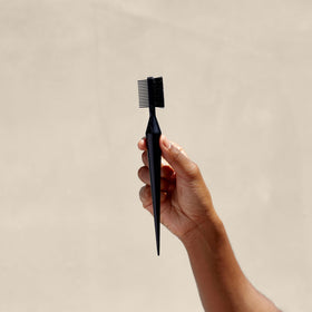 PATTERN Edge Tool parting comb aids precise sectioning during styling.