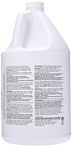 Paul Mitchell Awapuhi Shampoo gallon bottle label closeup highlighting nourishing Awapuhi extract.