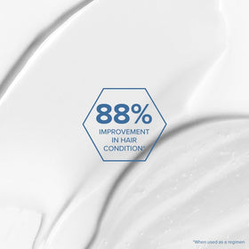 Close-up of Bond RX texture showing lightweight formula on fragile hair