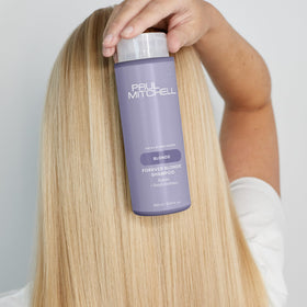 Paul Mitchell Forever Blonde Shampoo bottle pour demonstrating easy distribution