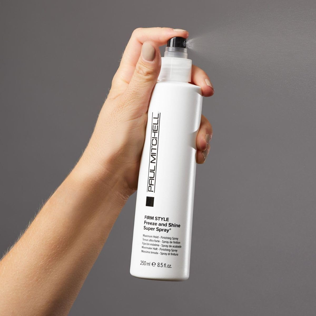 Paul Mitchell Freeze and Shine mist demonstrates flexible hold for everyday styles
