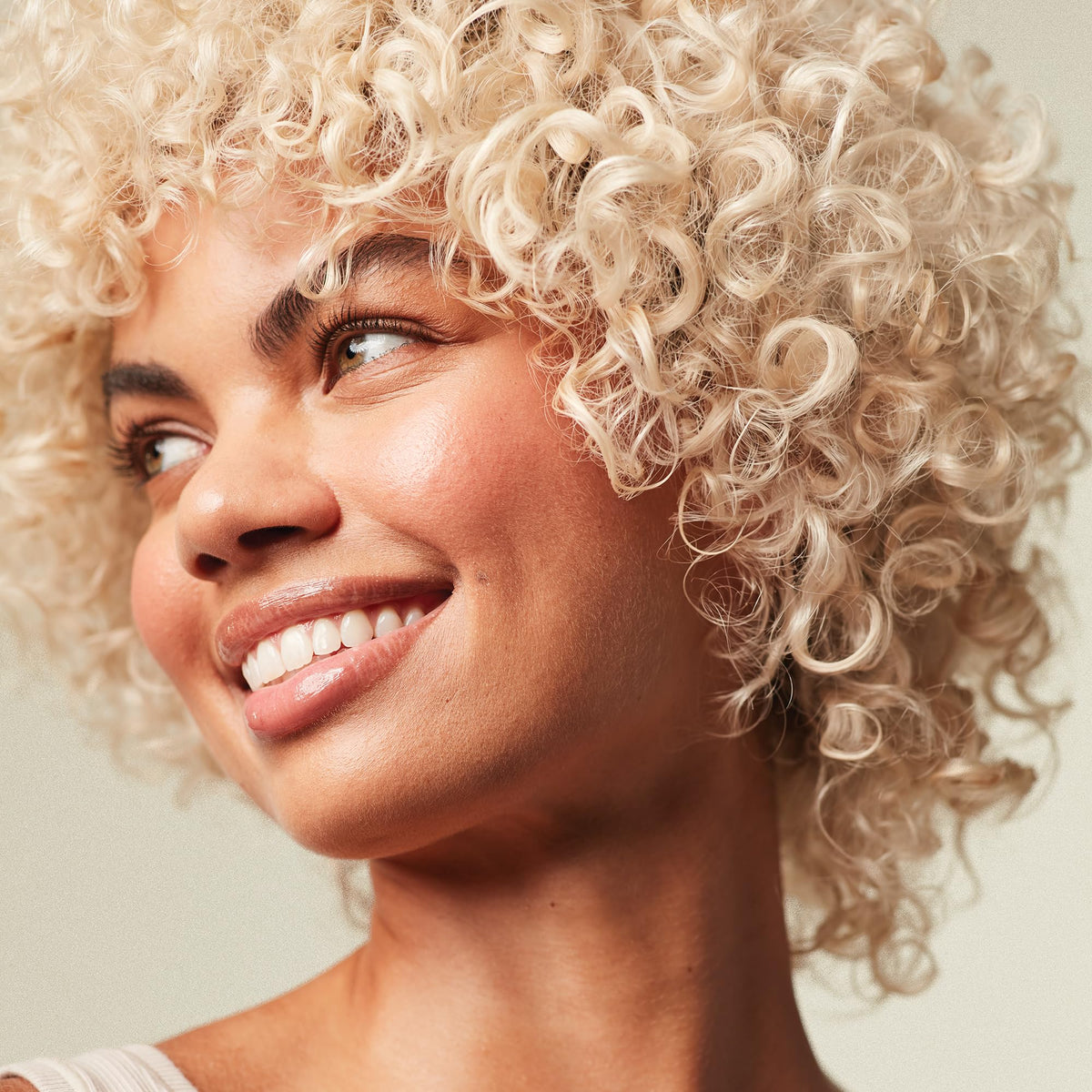Paul Mitchell bottle close-up shows moisture-boosting formula for blondes