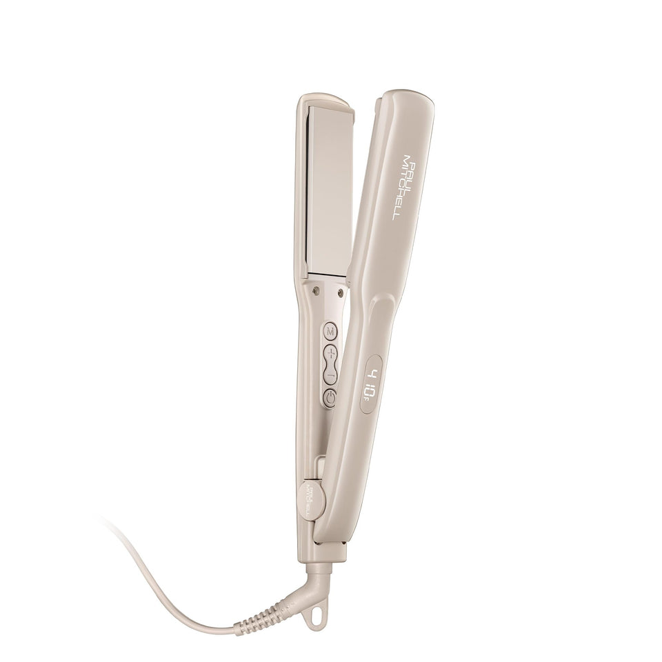 Paul Mitchell Smooth+ flat iron taupe with 1.25-inch plate for sleek, frizz-free styling.