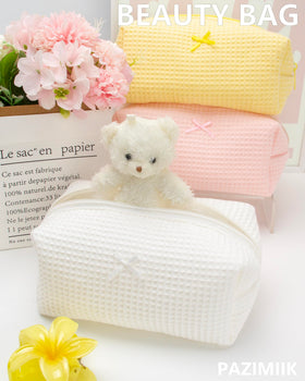 PAZIMIIK soft cream-white travel case complements vanity and trips.