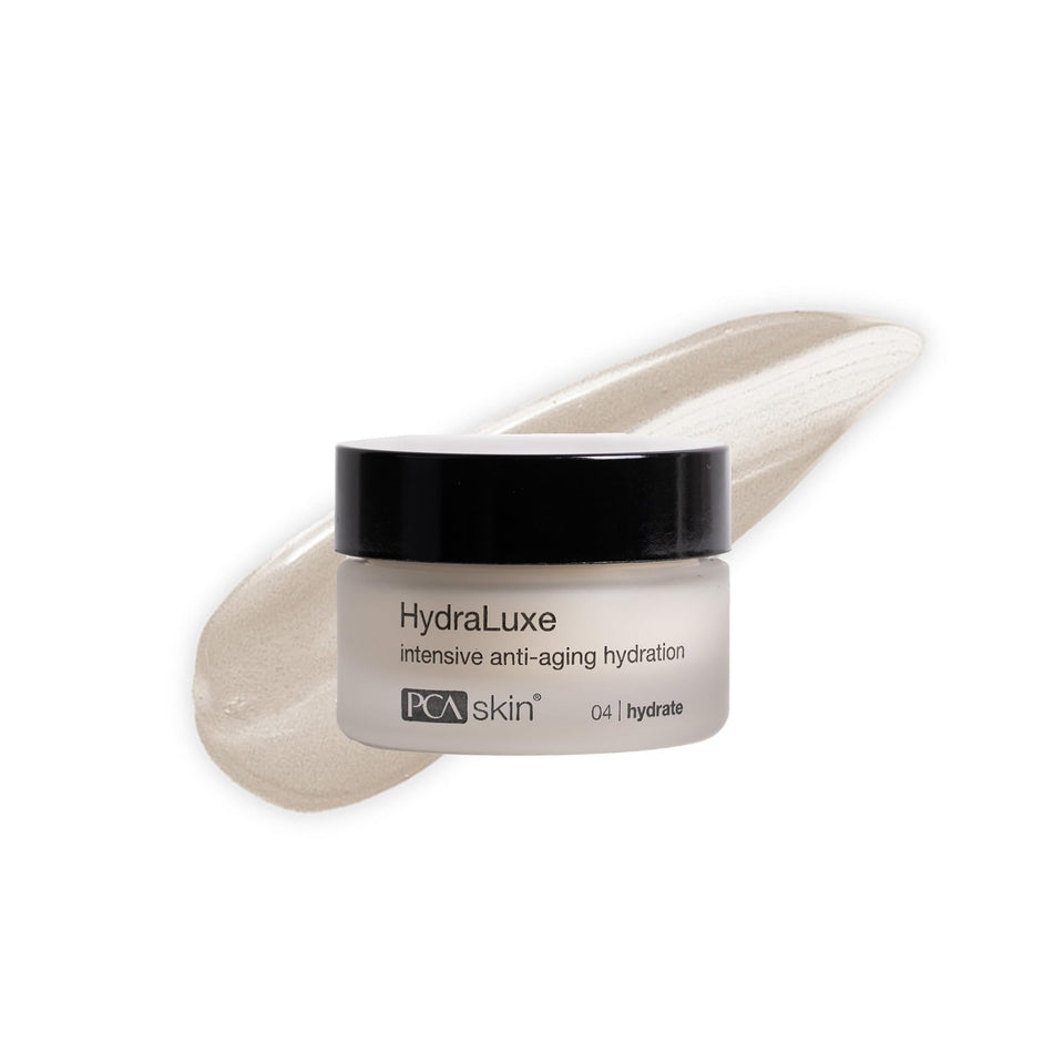 PCA SKIN HydraLuxe anti-aging cream bottle demonstrates daily hydration for dry skin.