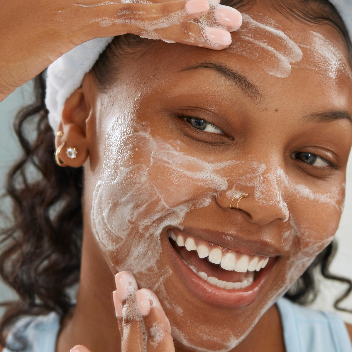 Peace Out Pore Perfecting Cleanser user applying during routine for clean, refreshed skin