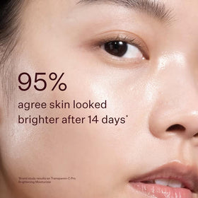 Peach & Lily Glass Skin Luminous Kit bottle close-up highlighting premium hydration formula