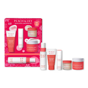 Peach & Lily Glass Skin Luminous Kit packaging for a festive glow and gift appeal