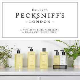 Pecksniff's Grapefruit & Citron hand wash bathroom scene conveys everyday luxury and fresh scent.