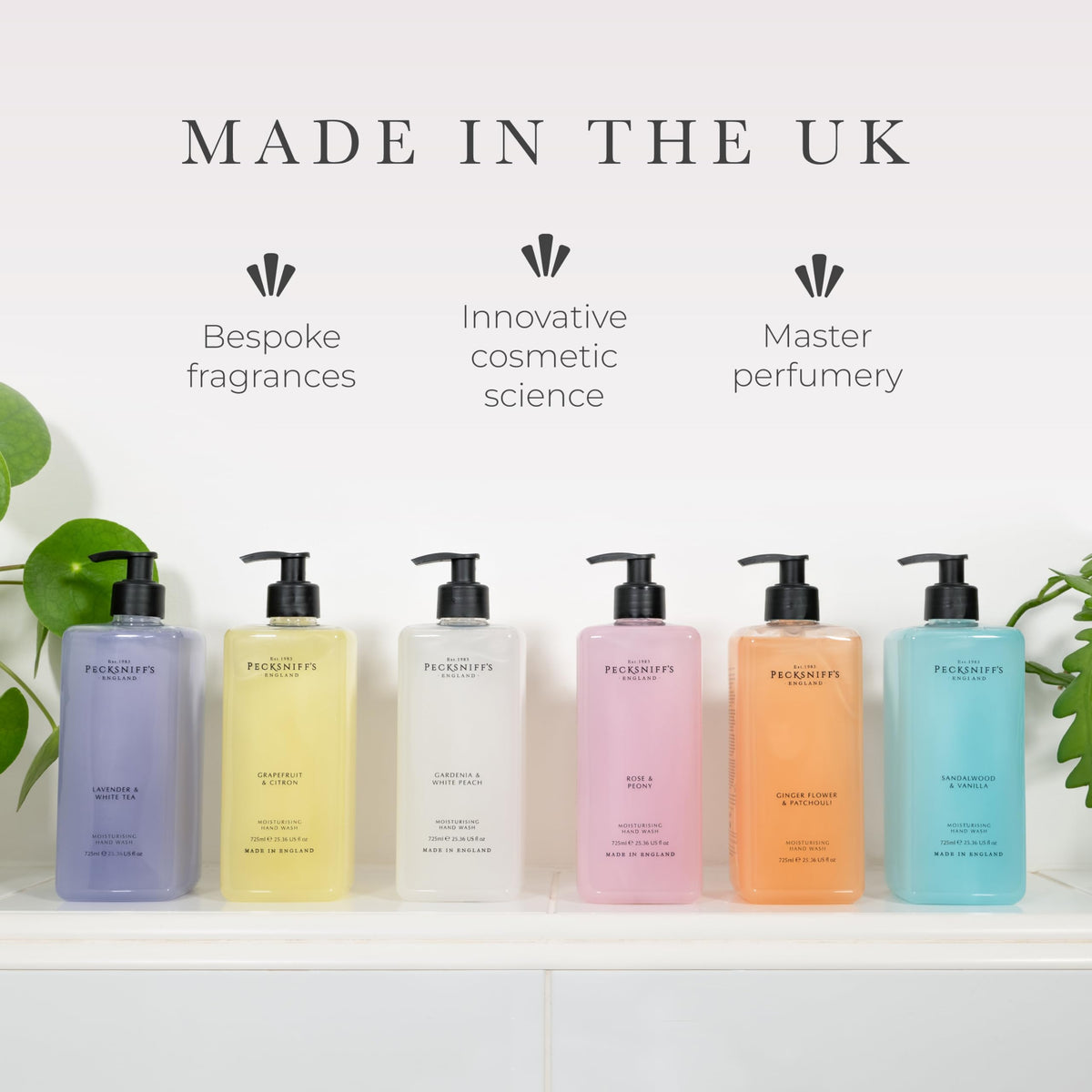 Pecksniff's Grapefruit & Citron hand wash bottle on shelf adds elegant decor.