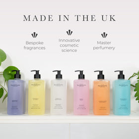 Pecksniff's Grapefruit & Citron hand wash bottle on shelf adds elegant decor.