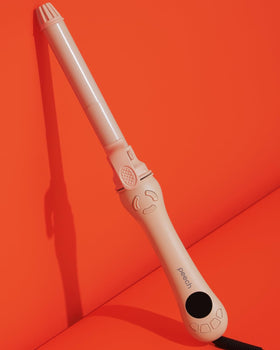 Peech rotating curling iron 1-inch 2025 in action creates smooth, defined curls.