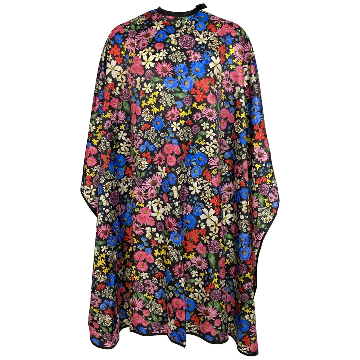 Pelocapa floral salon cape with adjustable snaps for a precise fit.