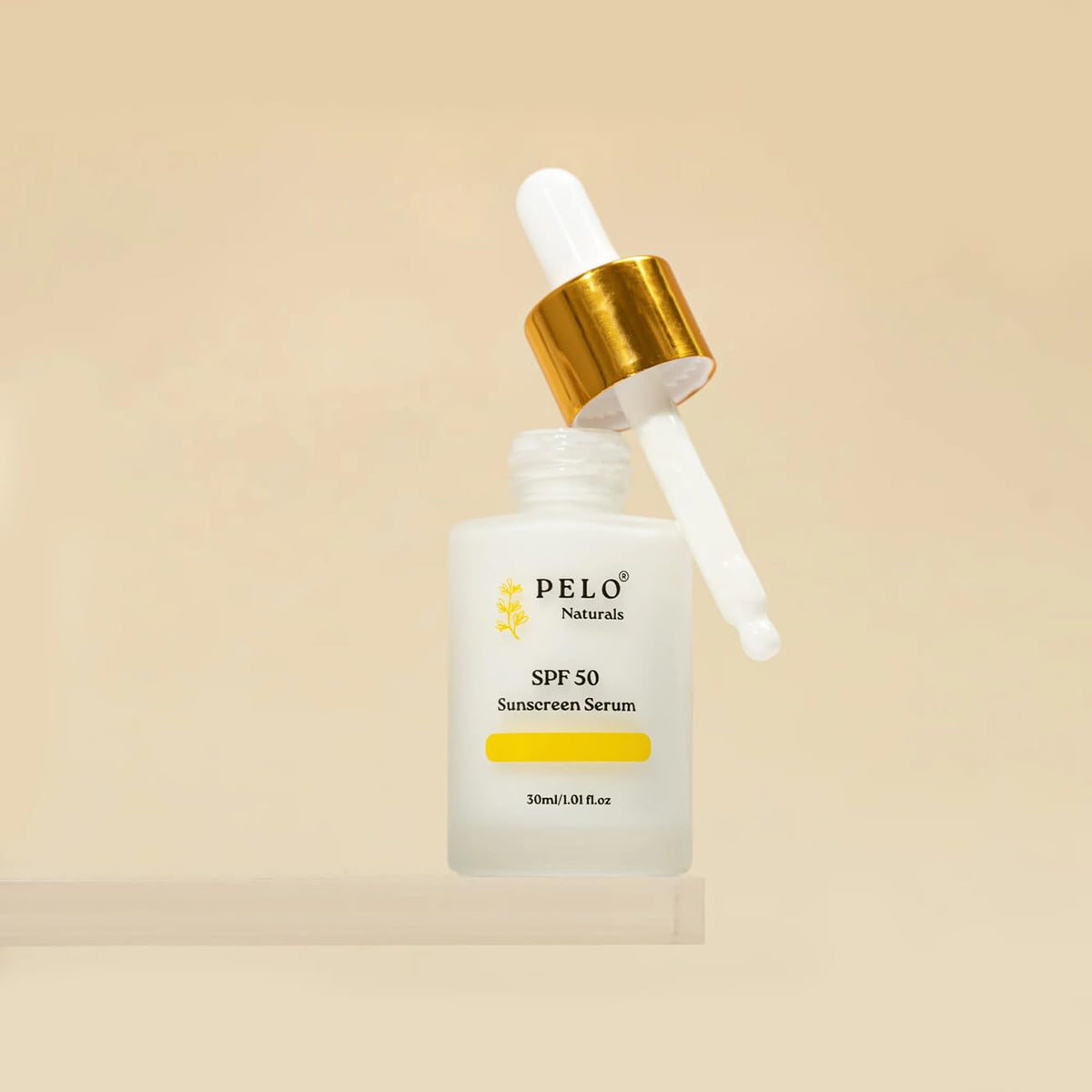 Travel-size PELO Naturals SPF 50 Serum for on-the-go protection.