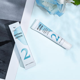 Portable PERMANIA packaging supports routine lash and brow treatments.