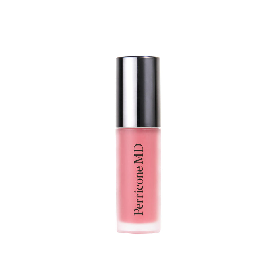 Perricone MD No Makeup Lip Oil bottle with pink grapefruit hydrates lips and adds natural shine.