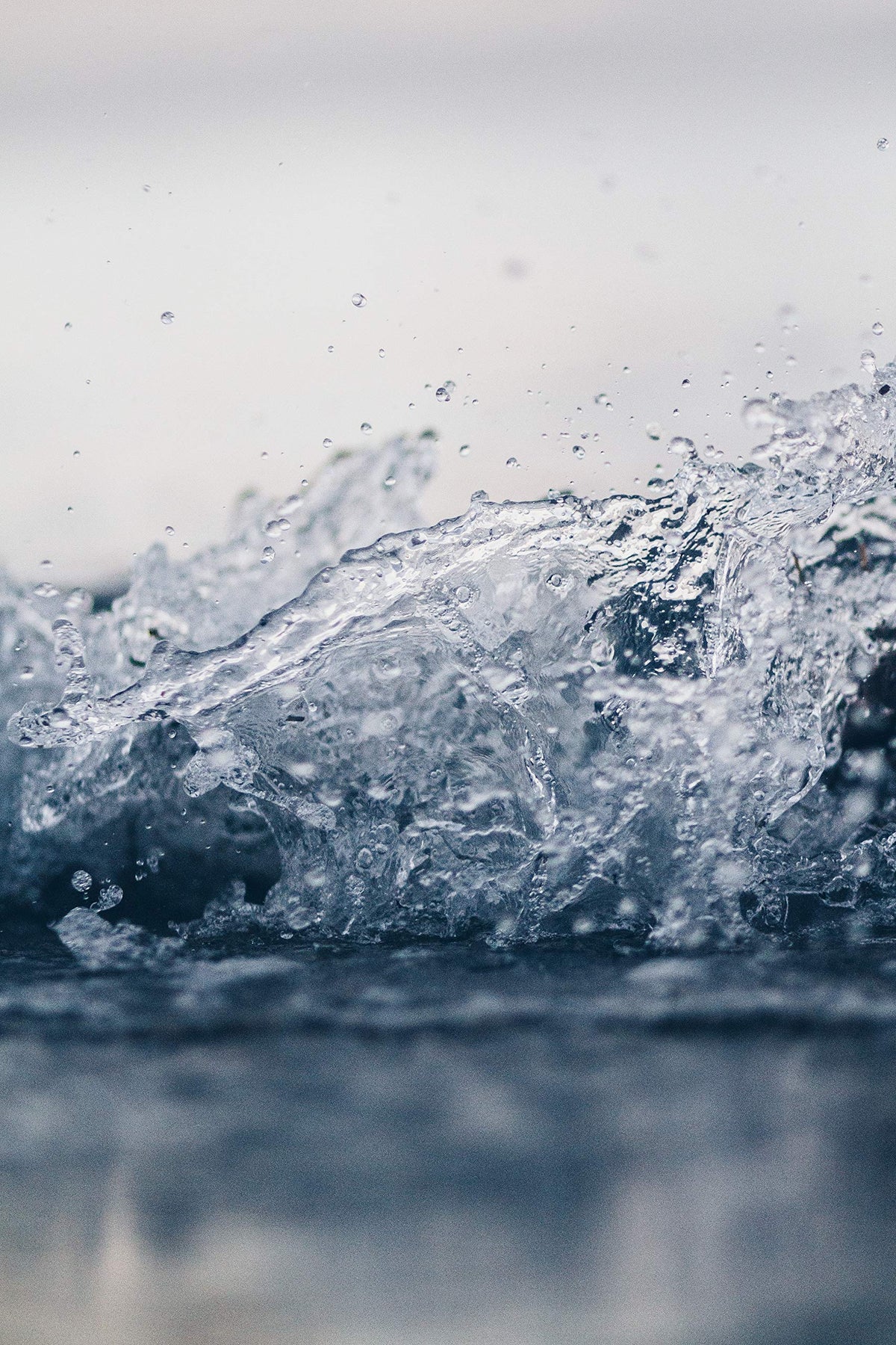 Perry Ellis Pure Blue spray nozzle in action suggests instant refreshment.