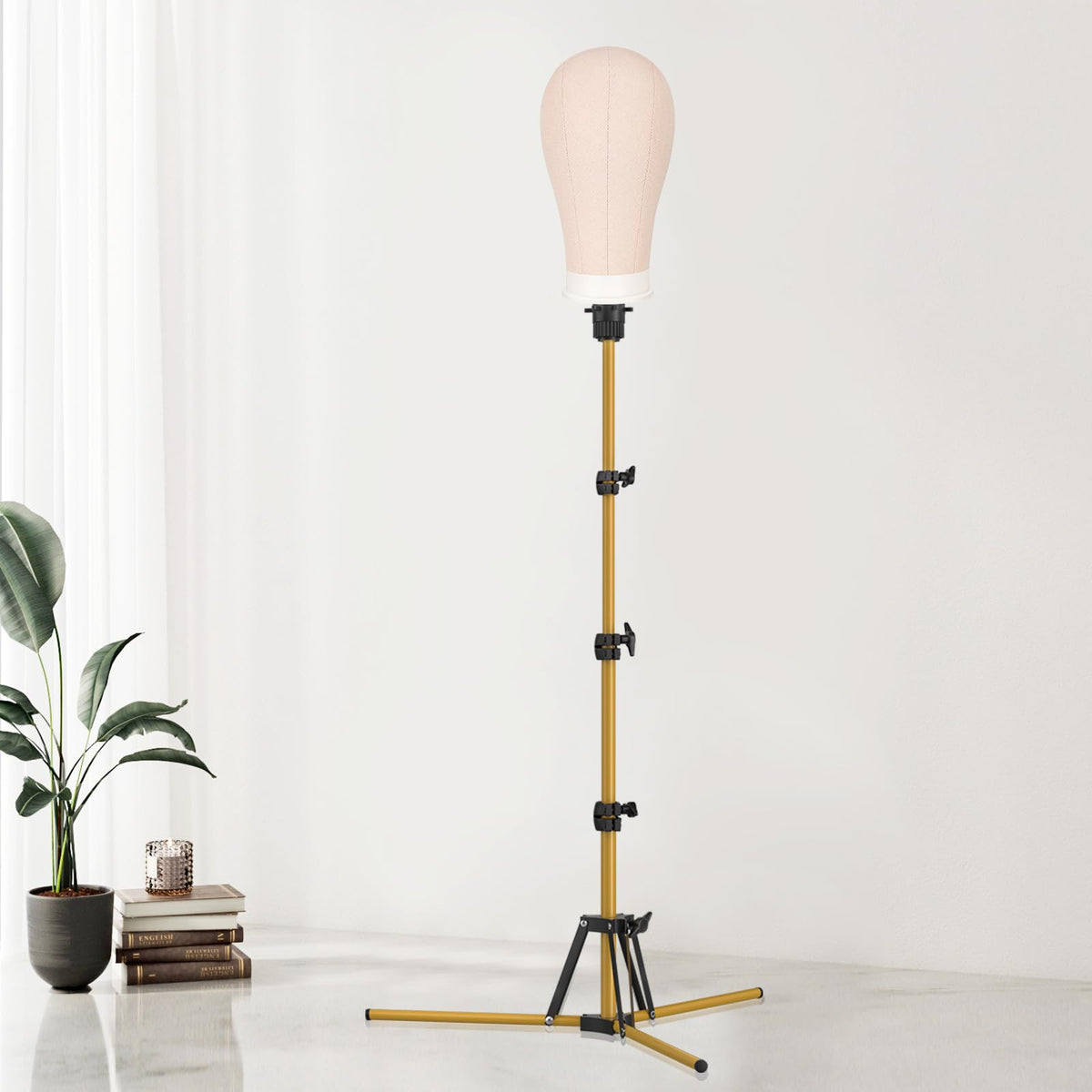 Pet Baby universal manikin holder stabilizes heads at varying heights.
