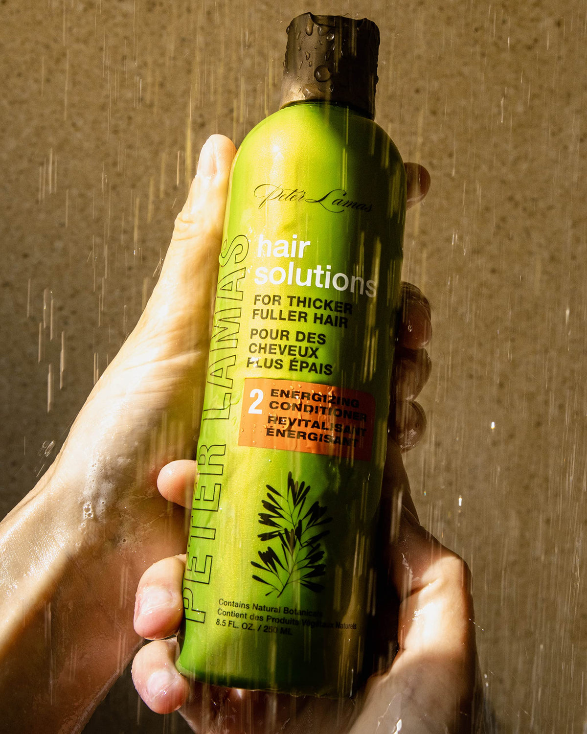 Ingredients panel on Peter Lamas Hair Solutions bottle featuring Biotin and Baicapil