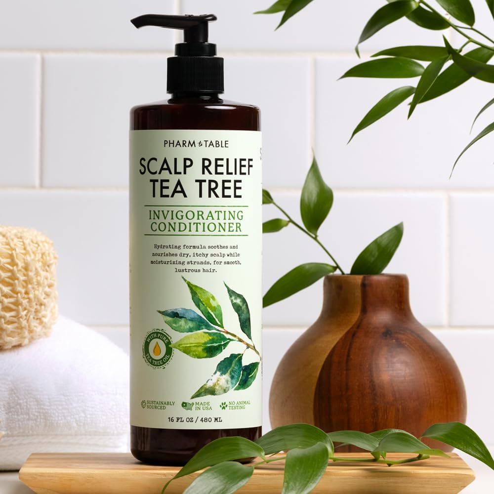 PHARM TO TABLE Tea Tree Conditioner applying on damp hair to detangle and soothe