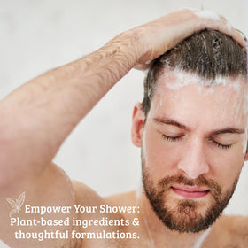 Pharmacopia Hotel Argan Oil Shampoo green tea leaves shot emphasizing refreshing fragrance