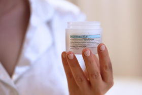 Pharmagel DN-24 Hydracrème applied to neck during routine for hydration.