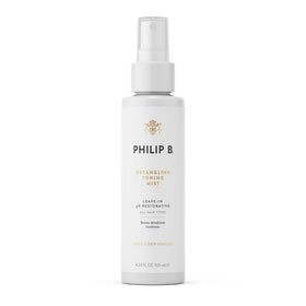PHILIP B Detangling Toning Mist bottle pour for glossy, detangled hair.