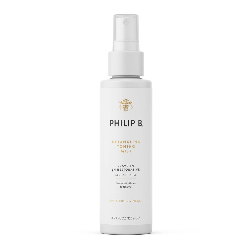 PHILIP B Detangling Toning Mist bottle pour for glossy, detangled hair.