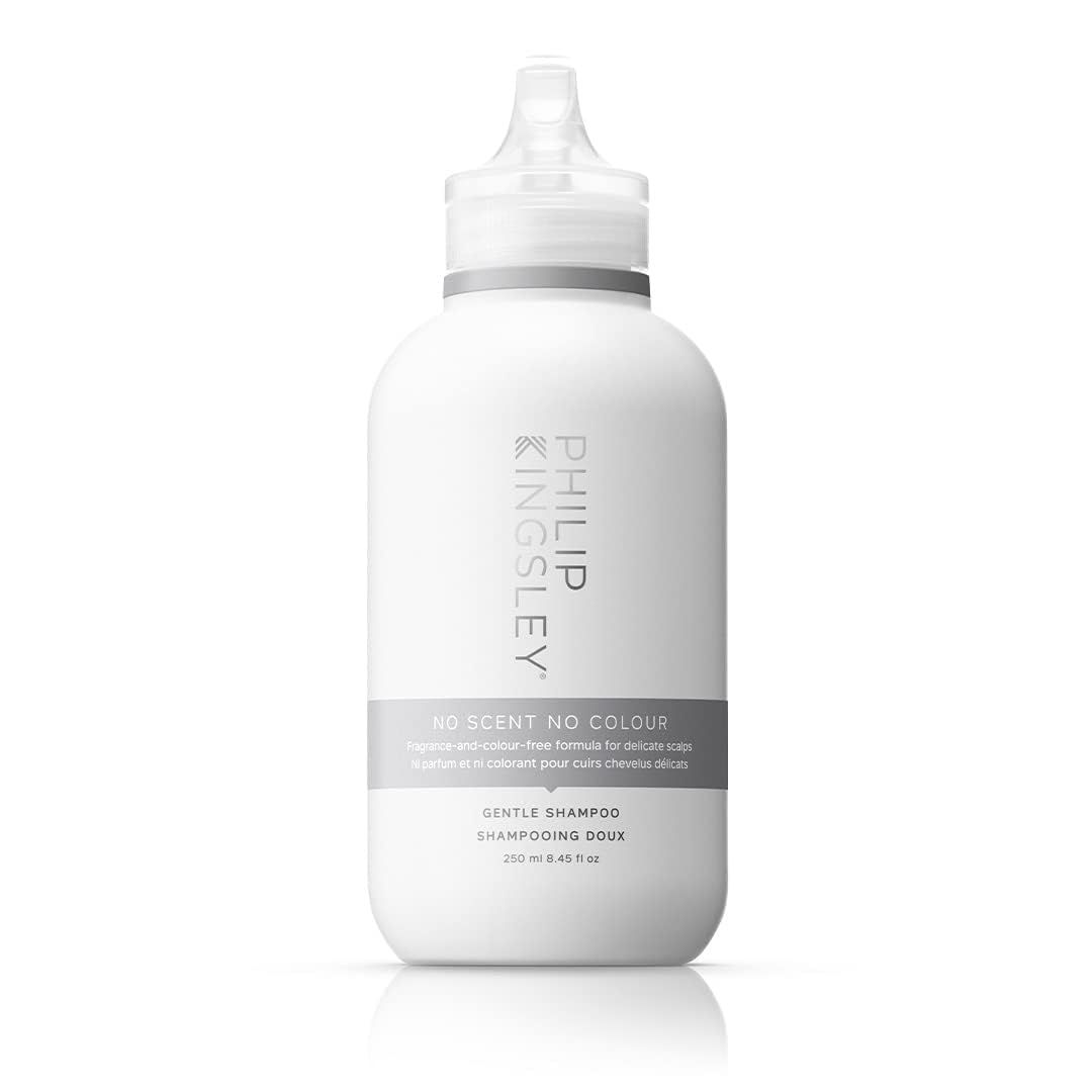 Philip Kingsley No Scent No Color Shampoo bottle on shelf, fragrance-free cleansing for sensitive scalps.