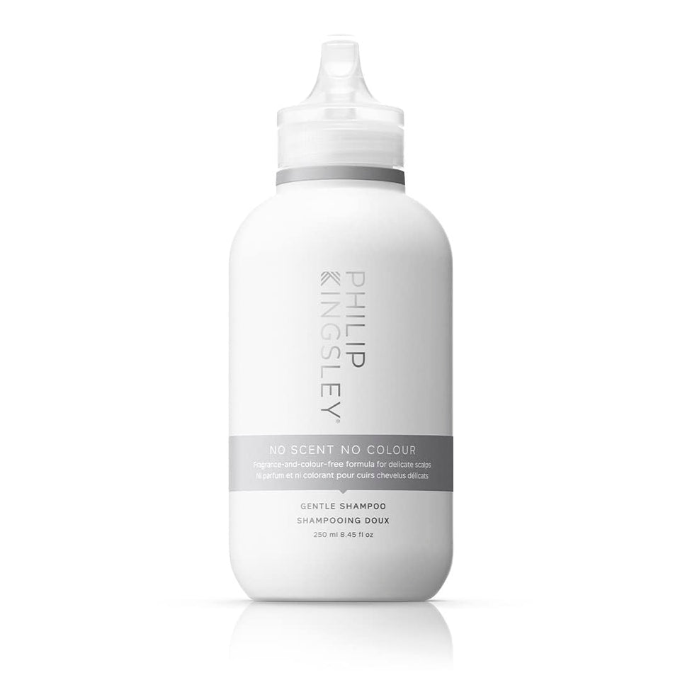 Philip Kingsley No Scent No Color Shampoo bottle on shelf, fragrance-free cleansing for sensitive scalps.