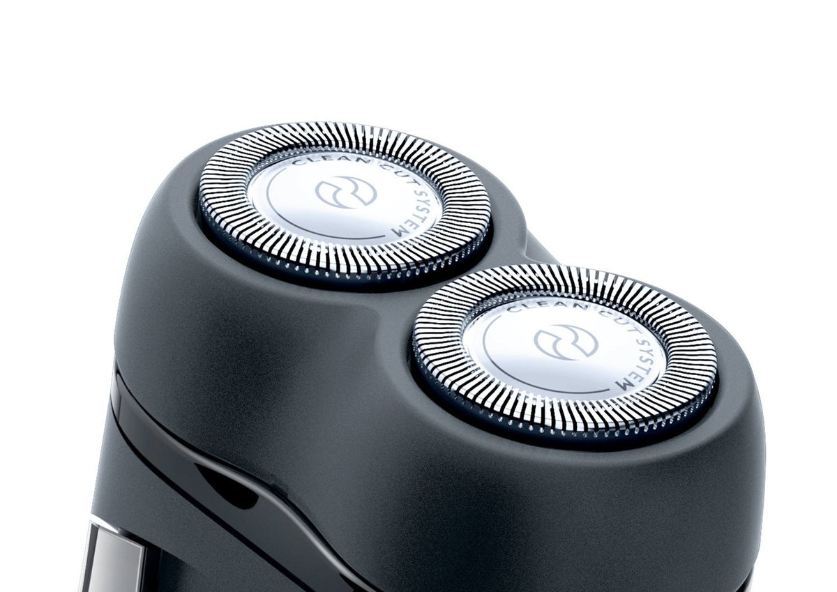 Two AA batteries included with the Philips Norelco travel shaver.