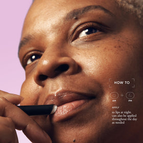 Philosophy Lip Fix Stick applied on lips with defined contours