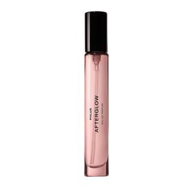 PHLUR Afterglow bottle showcases warm amber vanilla for a lasting aura.