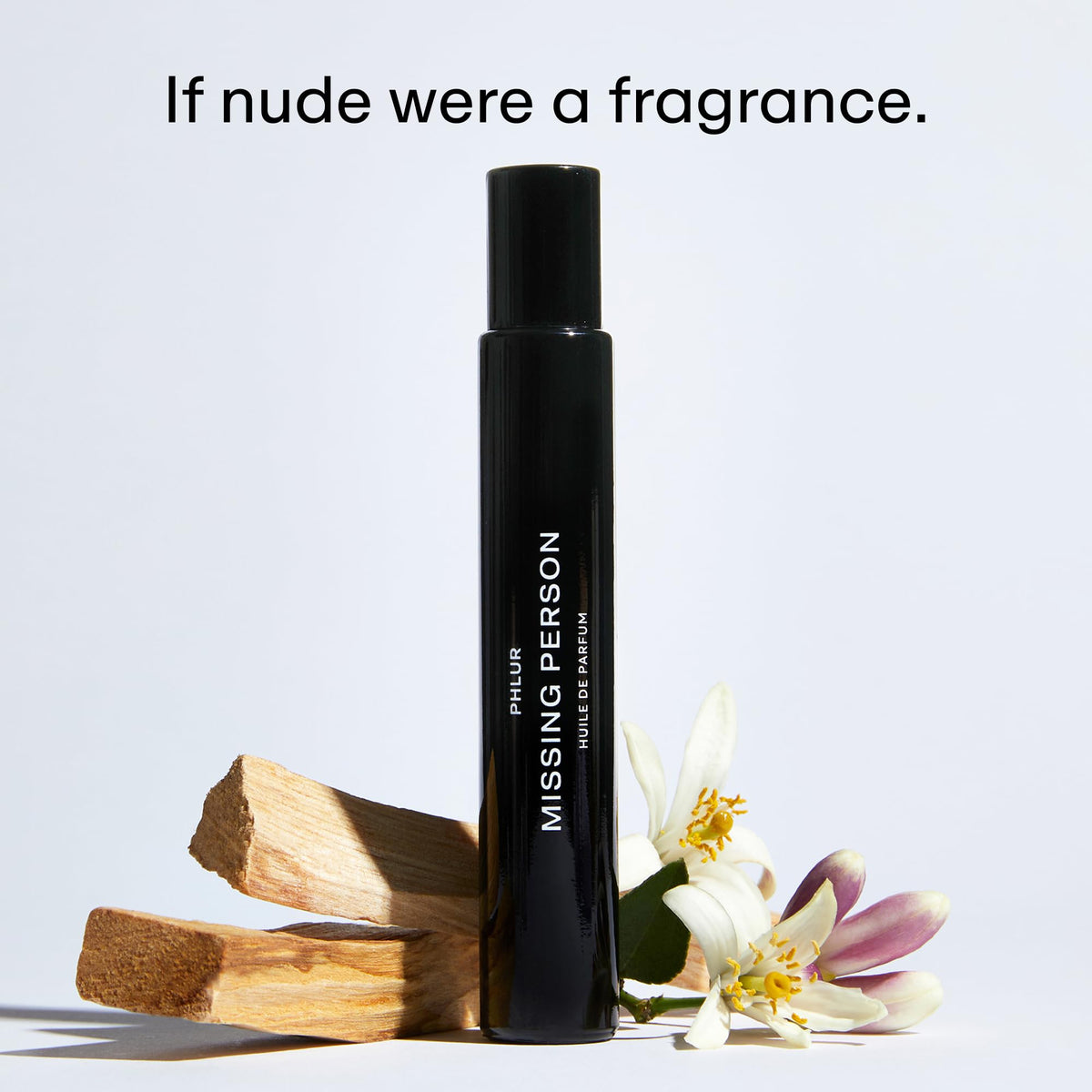 PHLUR Missing Person bottle close-up showcases refined floral musk fragrance